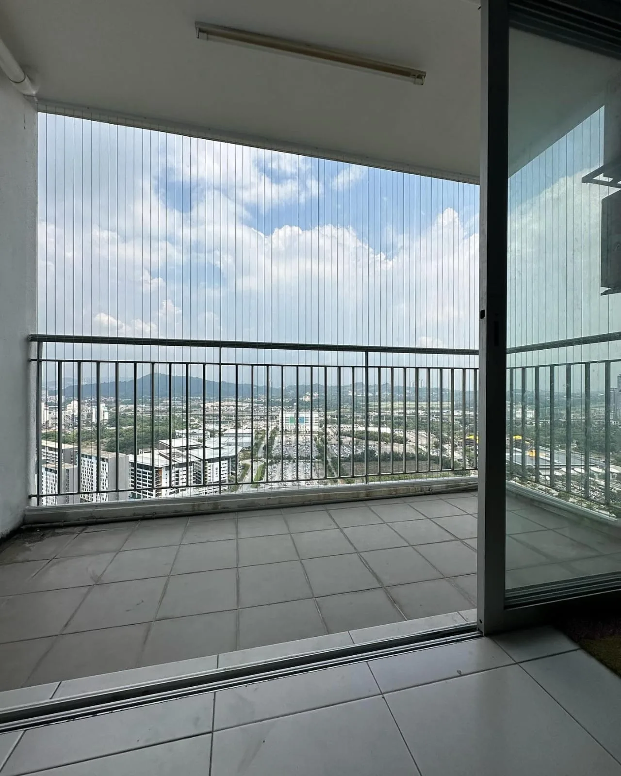 Invisible grill for balcony in Hyderabad — 316L marine-grade SS cable installed by Mr. Mosquito