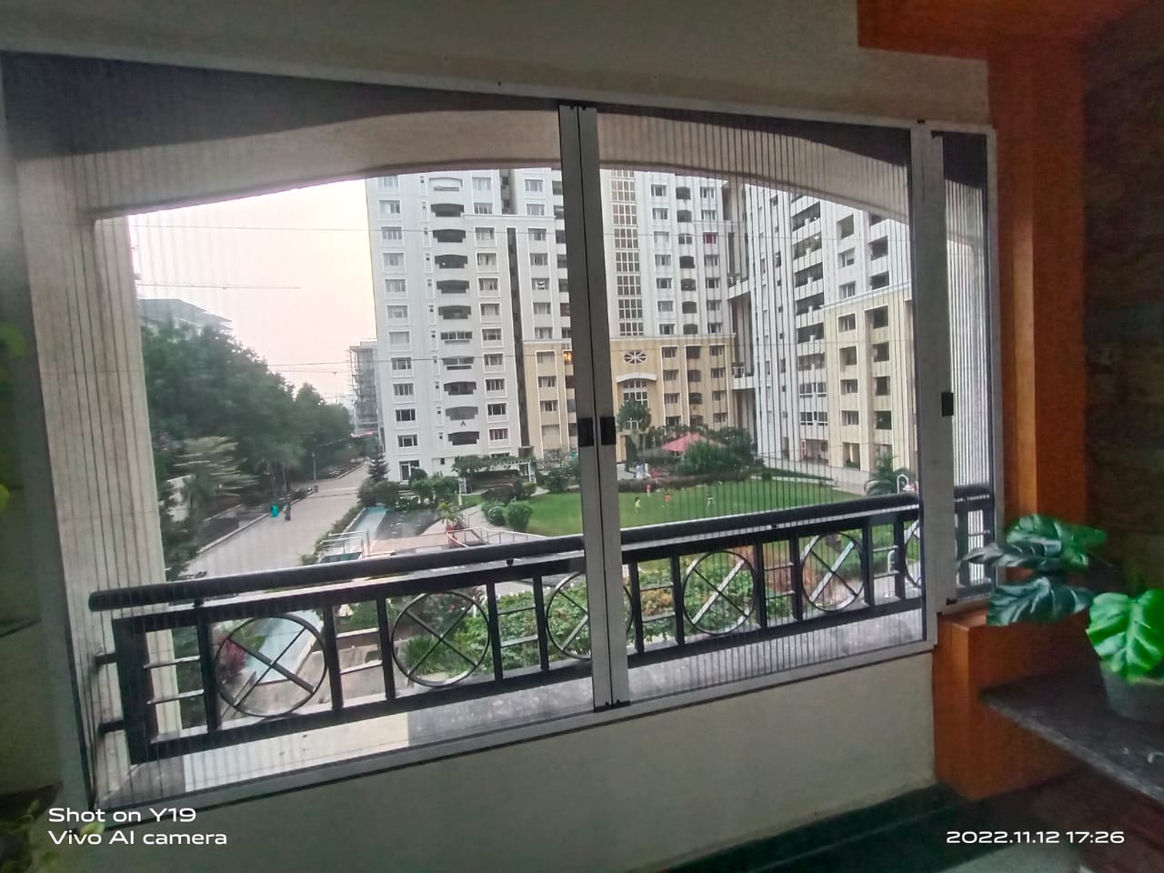 Premium pleated balcony screens Hyderabad — accordion mosquito screen installation